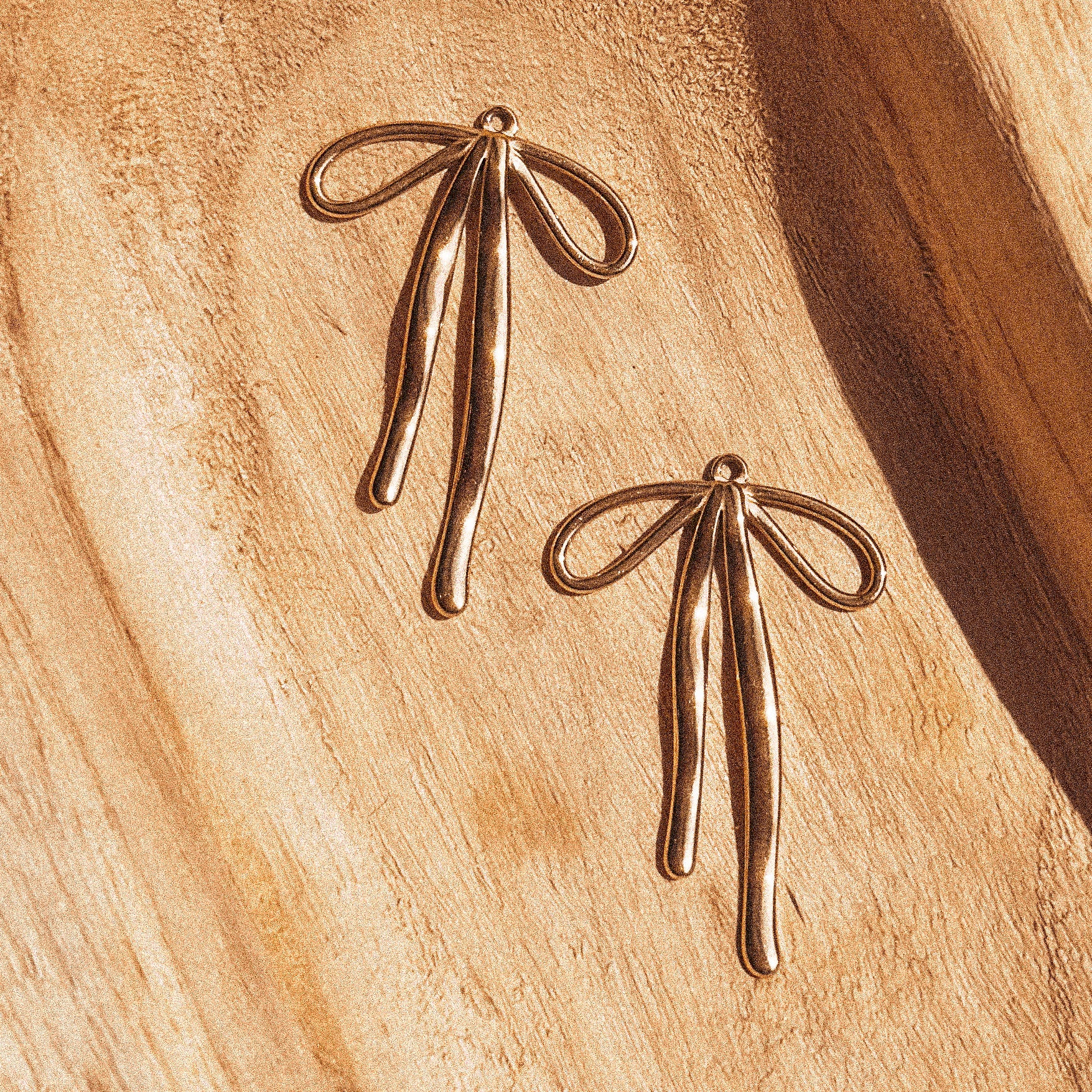 Elegantly Charming Bow Charm - C138