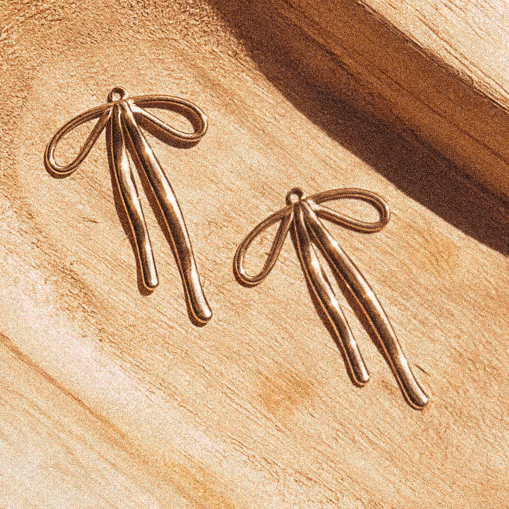 Elegantly Charming Bow Charm - C138