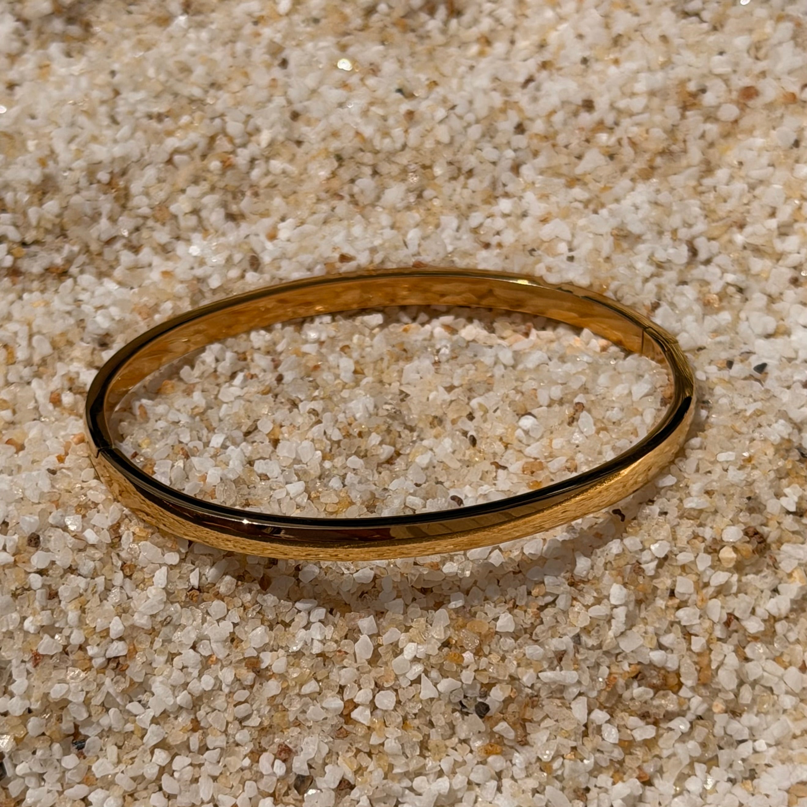 Golden Oval Clasp Bangle: SS27