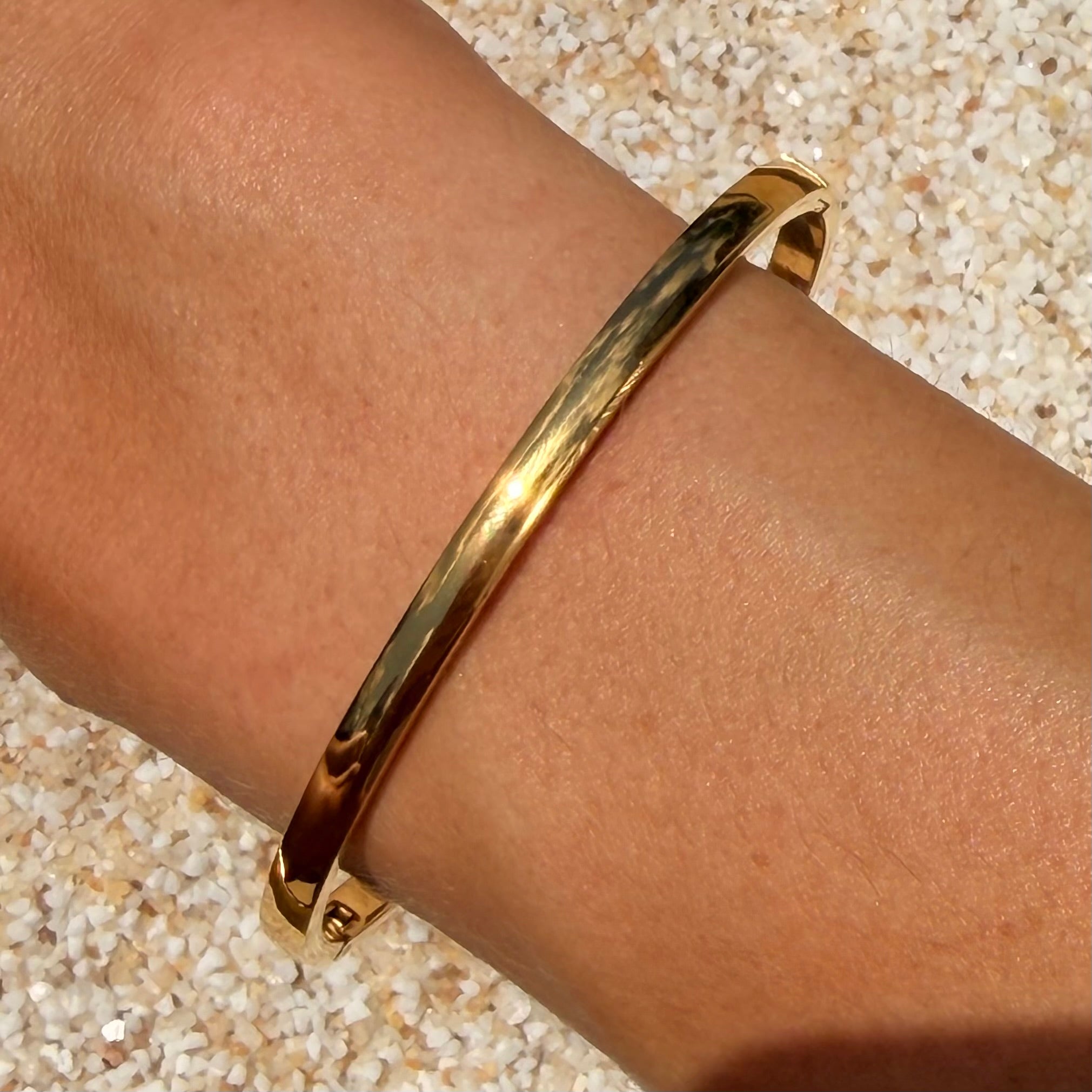 Golden Oval Clasp Bangle: SS27